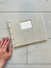 Hand-Bound Book: Ivory cream fabric, coptic stitch, 9 x 7 inches