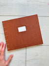 Hand-Bound Book: Brown fabric, coptic stitch binding, 8.5 x 7 inches