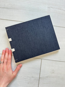 Hand-Bound Book: Black fabric, tape binding, 9 x 7 inches