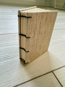 Hand-Bound Book: Ivory fabric, coptic binding, 3.25 x 4.25 inches