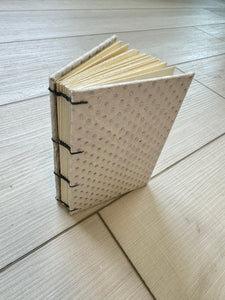 Hand-Bound Book: White silver dot paper, coptic binding, 3.25 x 4.8 inches