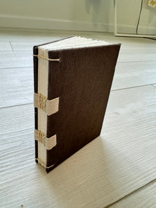 Hand-Bound Book: Brown fabric, tape binding, 3.25 x 4.75 inches
